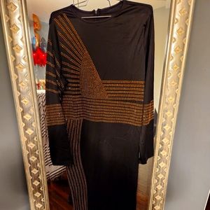 Brand new, never been worn, black long dress.